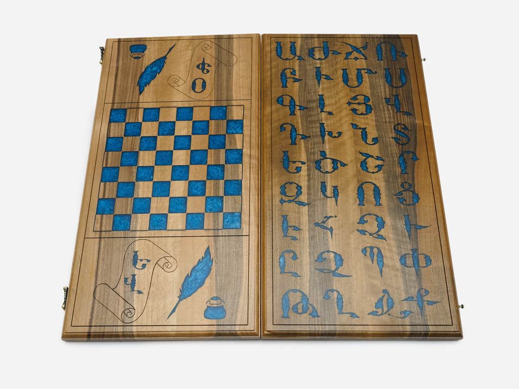 Detail of the walnut frame around the alphabet inlay