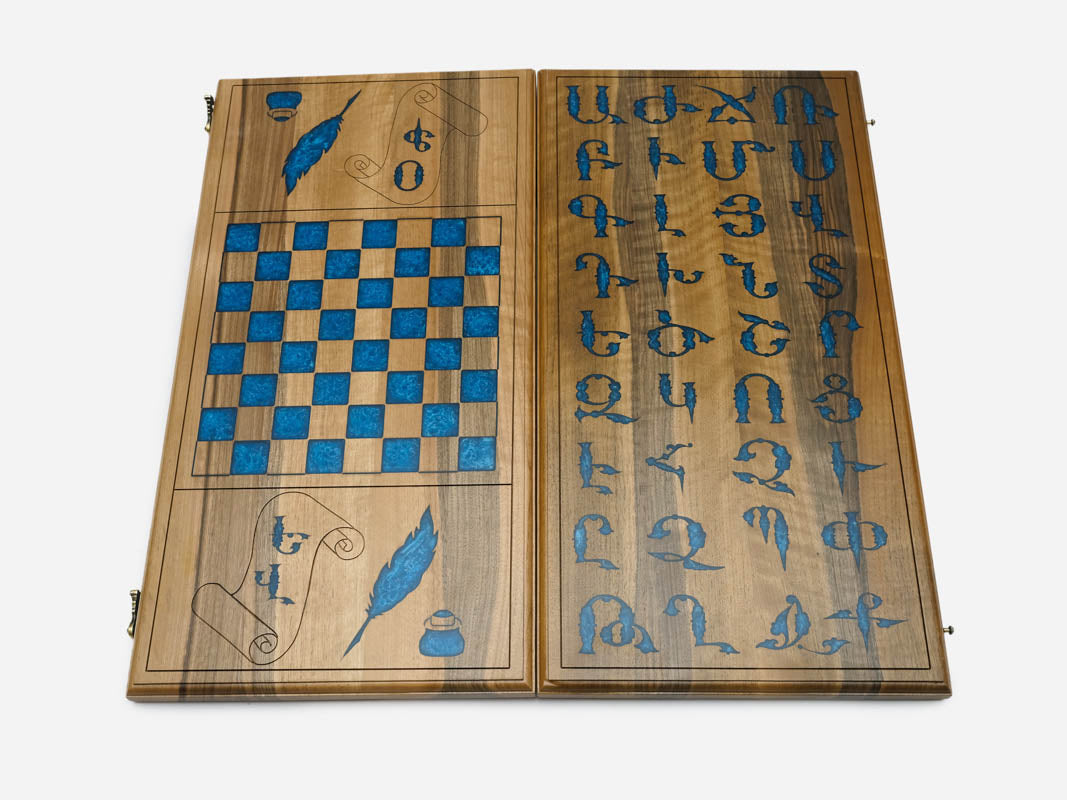 Detail of the walnut frame around the alphabet inlay