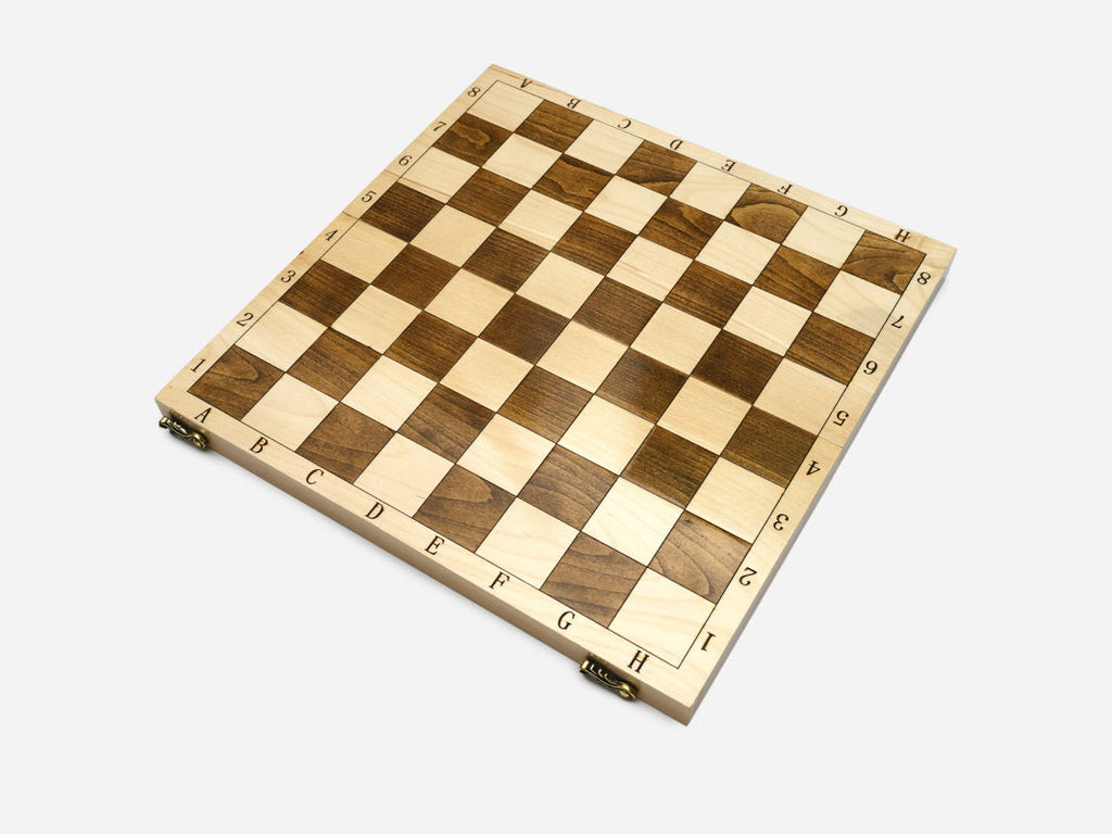Folding wooden chess set with bronze clasps