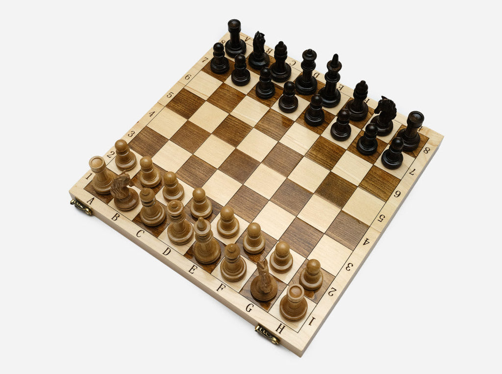 Warm beech grain on the classic folding chessboard