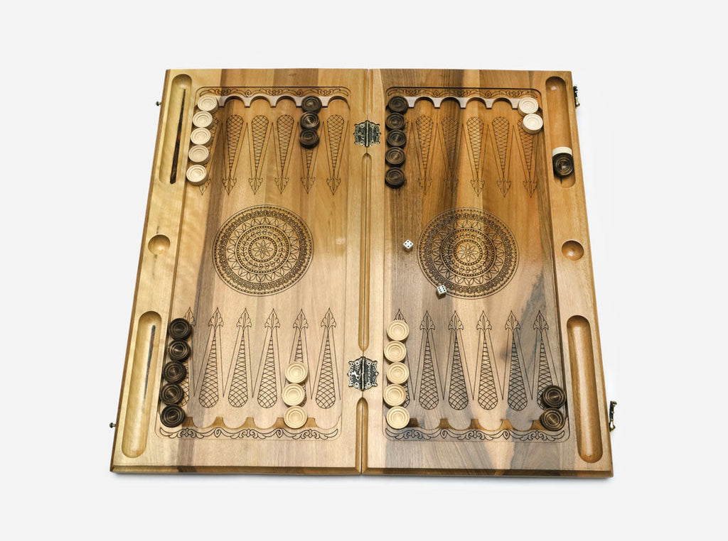 Angled view of the wood-slice epoxy backgammon board