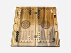 Angled view of the wood-slice epoxy backgammon board