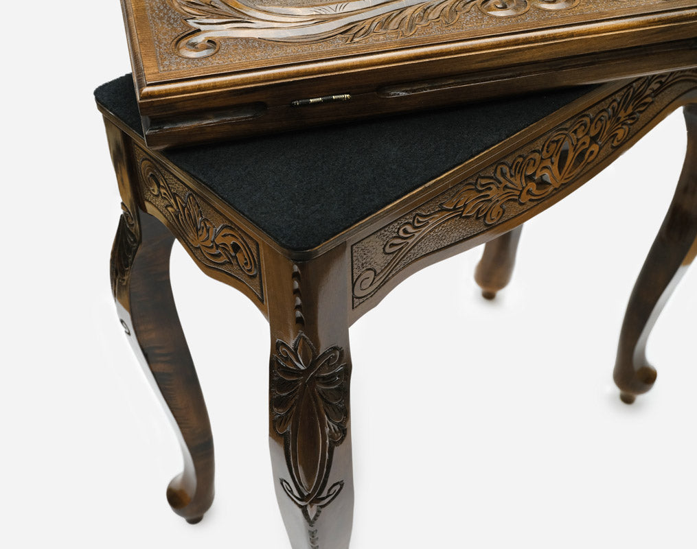 Close-up of the inlaid rearing horses on the backgammon table lid