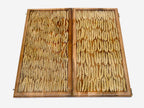 Close-up of the wheat ears embedded in glossy epoxy