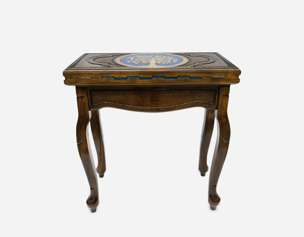 The folding chess table closed and standing as a display side table