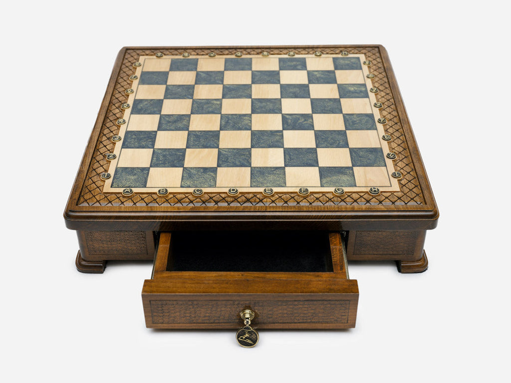Gray epoxy chess set set up for play, angled view