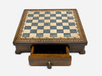 Gray epoxy chess set set up for play, angled view