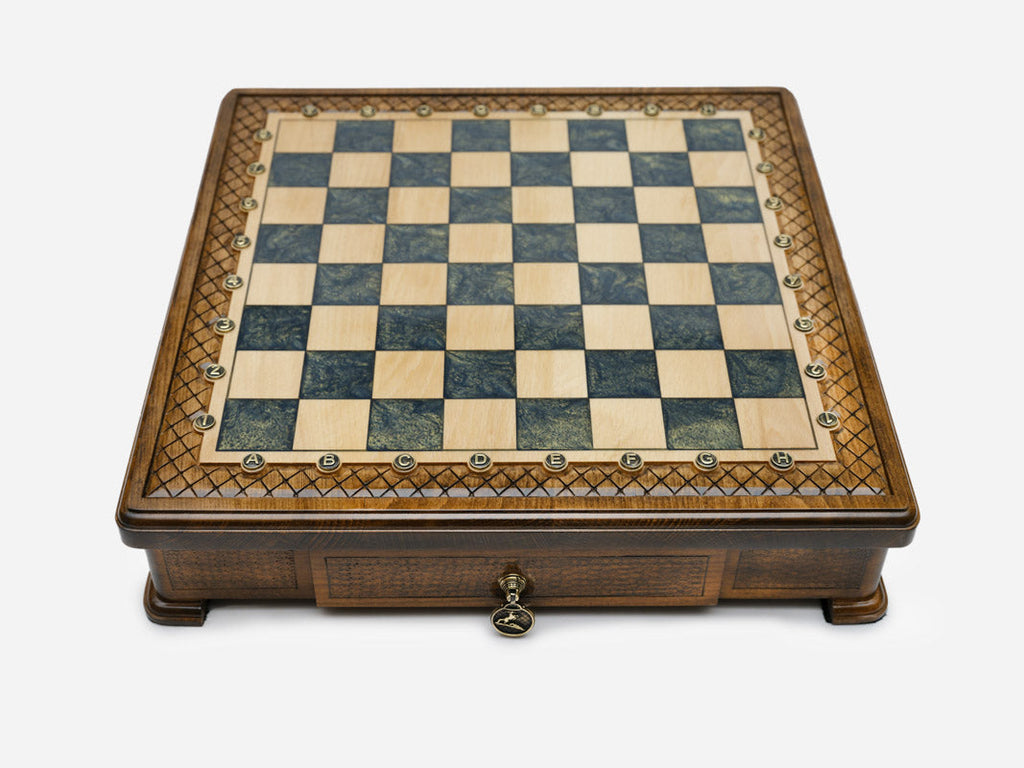 Gray epoxy chess set closed, angled view showing the drawer and feet