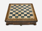 Gray epoxy chess set closed, angled view showing the drawer and feet