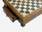 Gray epoxy chess set set up for play, straight front view