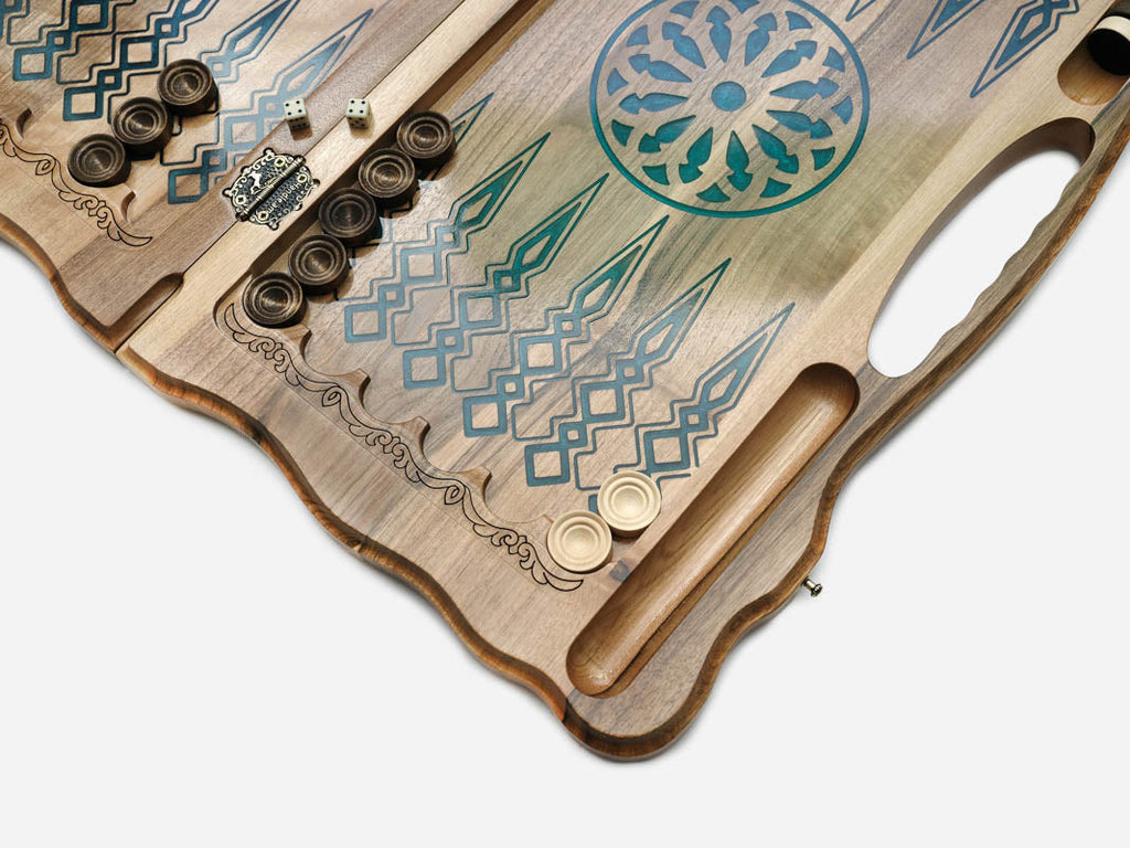 The open backgammon layout with wooden checkers