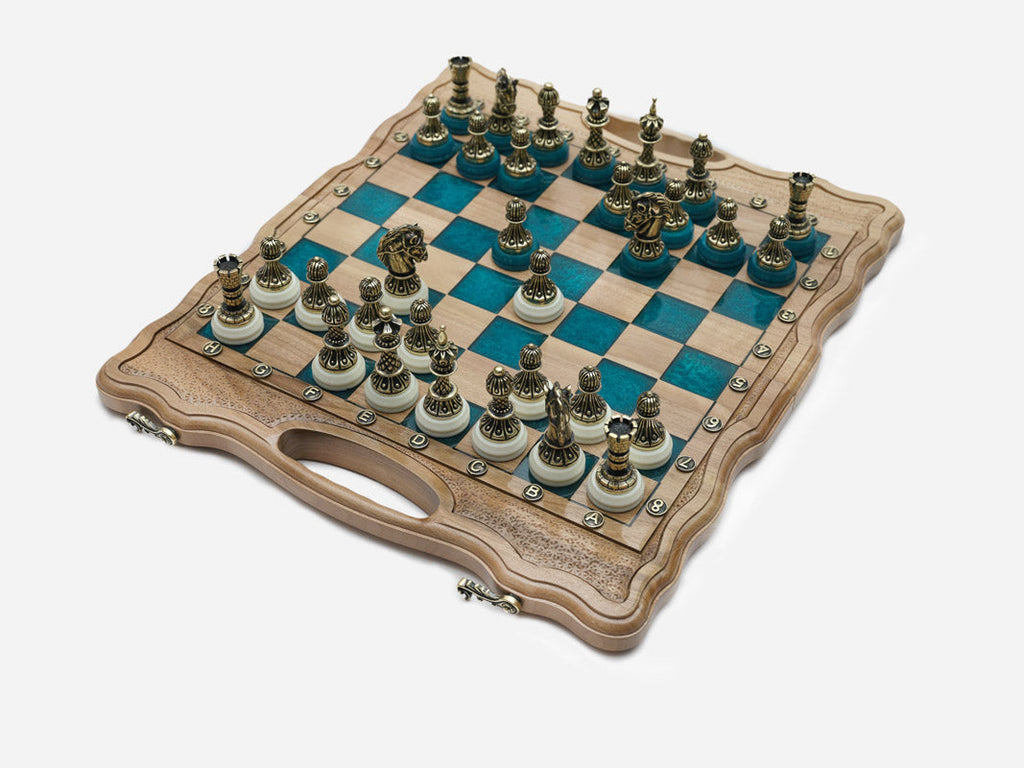 The folding board partly closed, showing its case form and bronze fittings