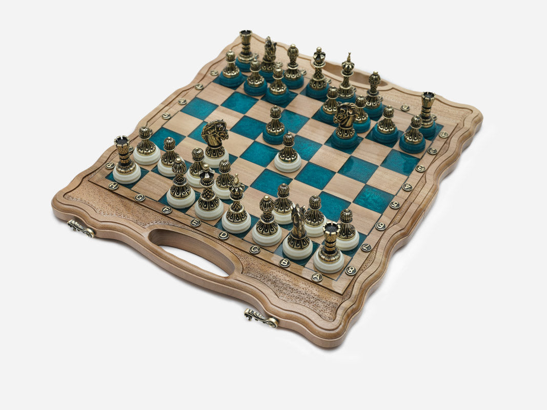 The folding board partly closed, showing its case form and bronze fittings
