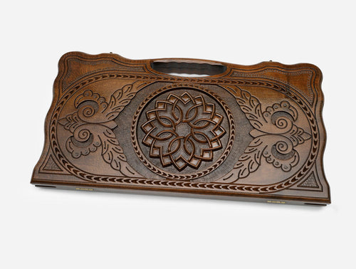 Angled view of the handmade Armenian backgammon set showing the carved lid