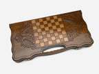 Close-up of the carved blossom at the centre of the board