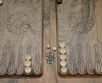 Deep walnut grain under the carved lattice