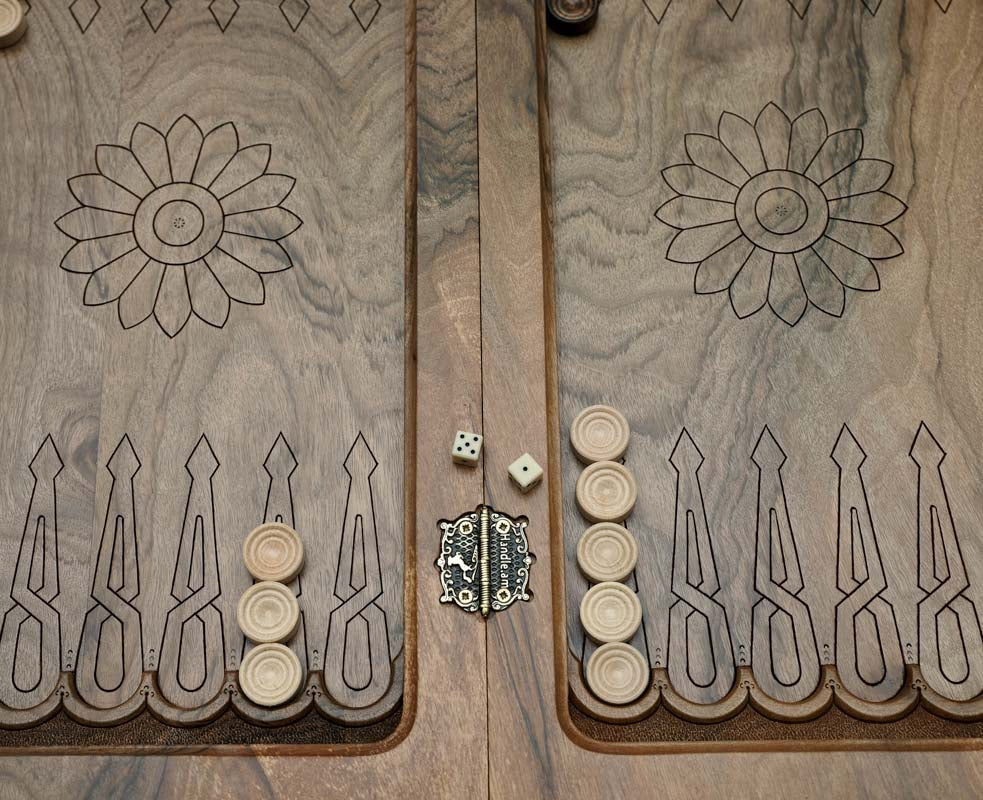 Deep walnut grain under the carved lattice