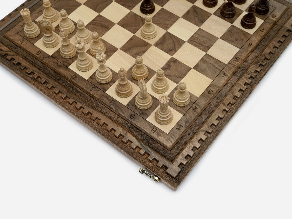 Lattice detail cut into the dark walnut frame