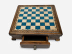 Blue epoxy chess set set up for play, angled view