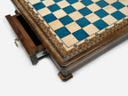 Close-up of the blue epoxy board corner on the chess set