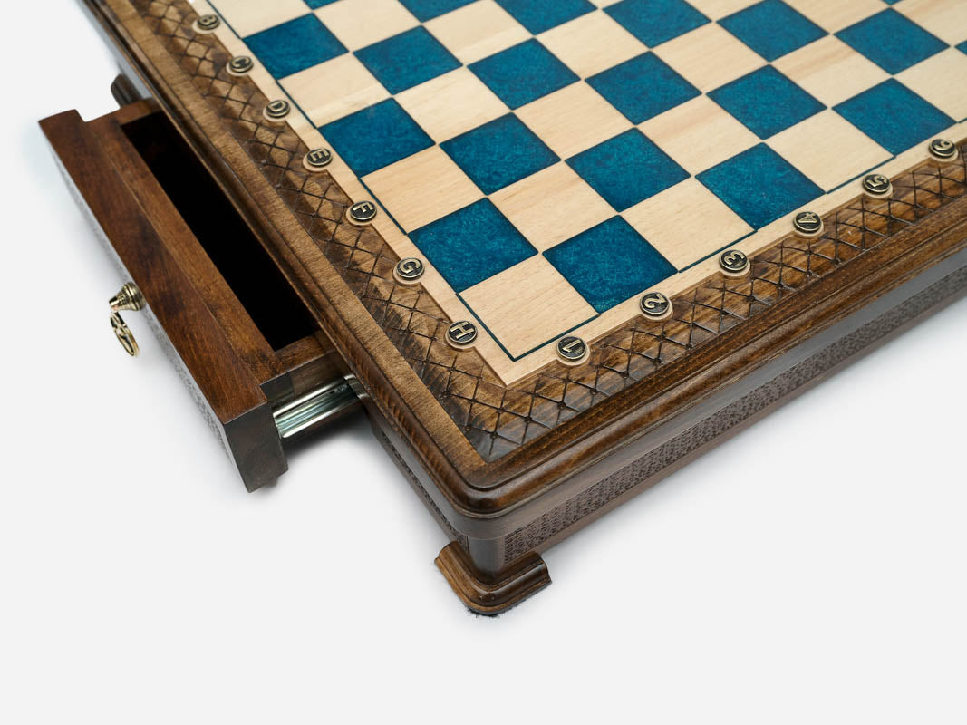Close-up of the blue epoxy board corner on the chess set