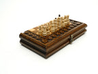 Handmade wooden chess set with carved fruit and vine ornament - detail