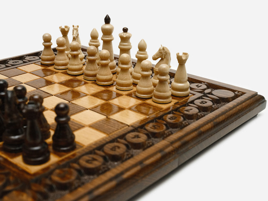 Carved pomegranate chess set - side view with bronze hardware