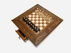 Carved chess set top-down view with the front drawer open