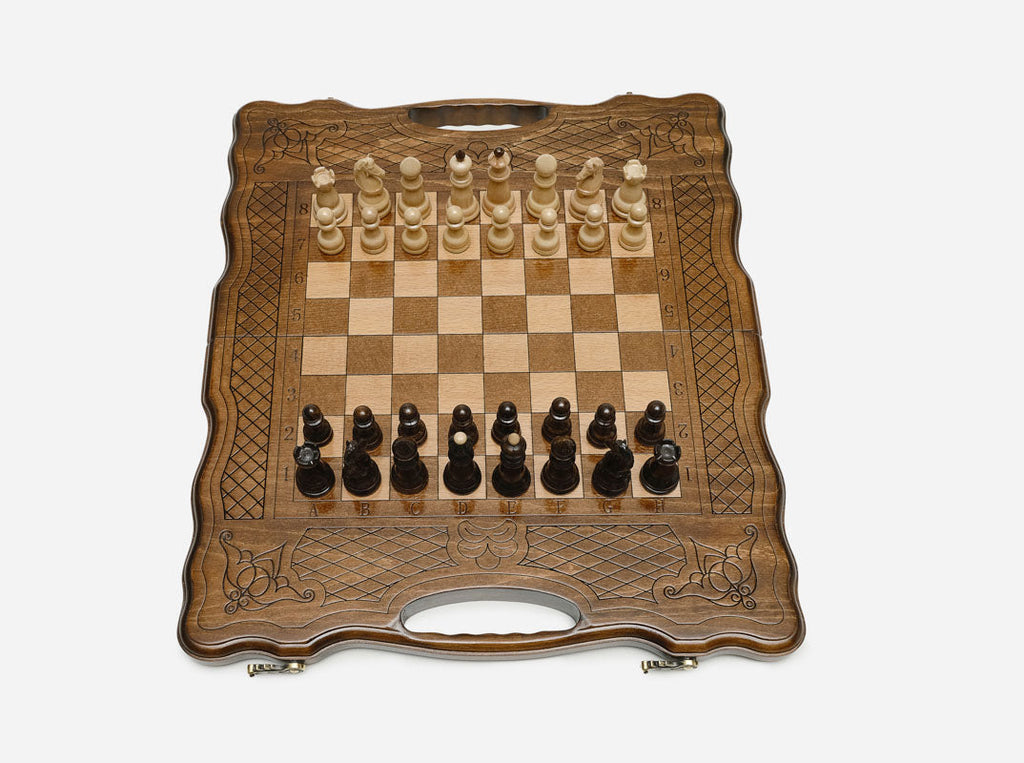 Clean hand-carved border on a classic wooden chess board - detail