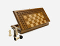 Travel chess set with carved ornaments and backgammon inside