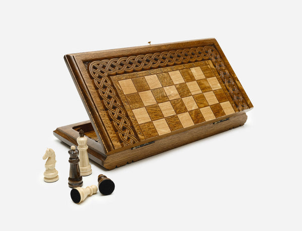 Travel chess set with carved ornaments and backgammon inside