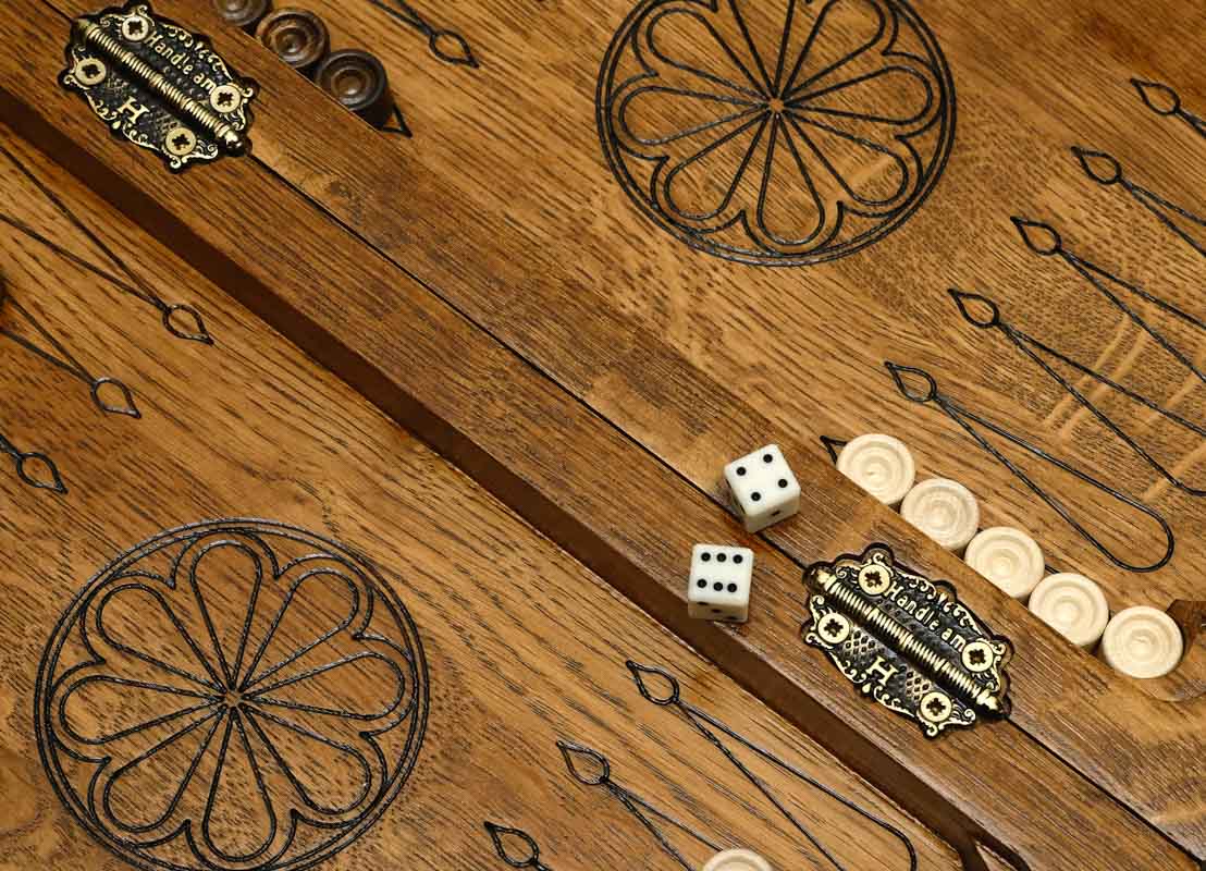 Carved ornament border on the travel board