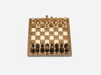 Tiny wooden chess set for the road