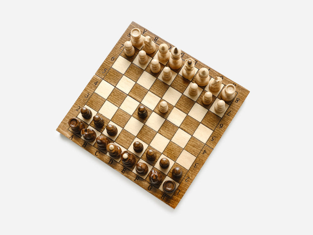 Pocket-size chess set with bronze clasps