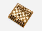 Pocket-size chess set with bronze clasps