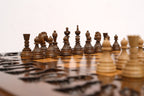 Octagon chess table, hand-cut geometric carving detail