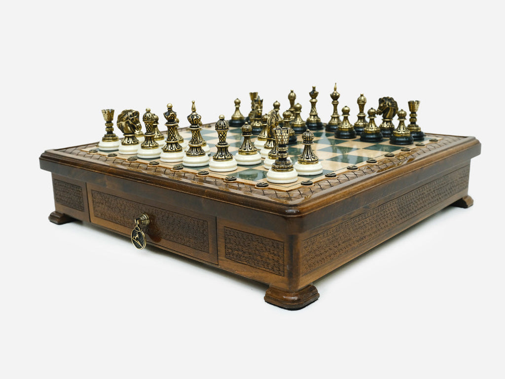 Green epoxy chess set closed, angled view showing the drawer and feet