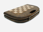 Close-up of the wooden checkers and the pair of dice