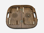 The open backgammon layout with checkers arranged on the carved points