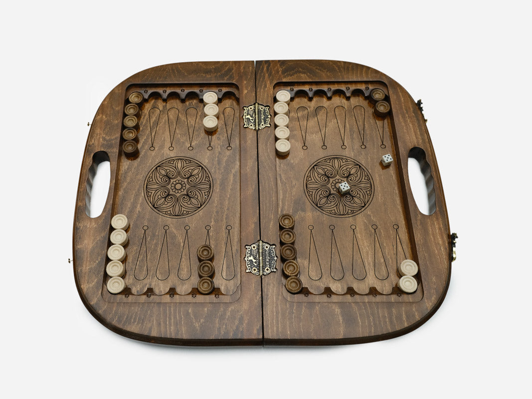 The open backgammon layout with checkers arranged on the carved points