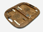 Top-down view of the opened board set up for chess with beech and walnut pieces