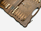 Carved chess and backgammon set shown folded