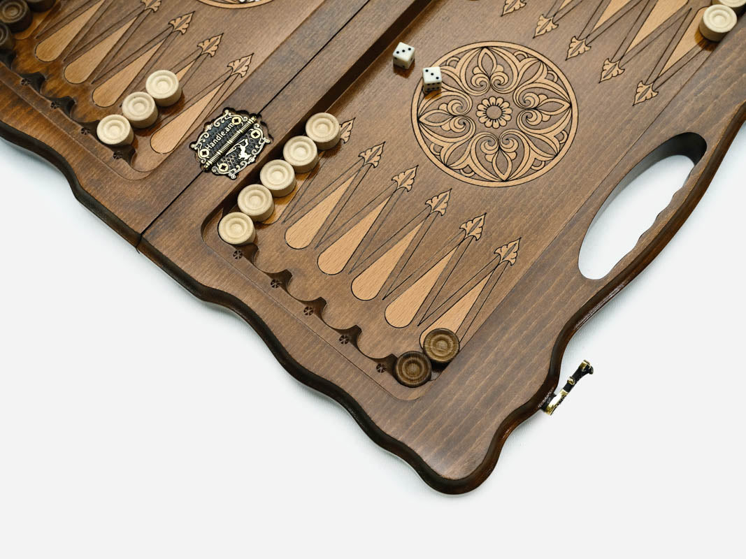 Carved chess and backgammon set shown folded