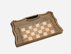 The classic travel chess set shown closed and ready to carry