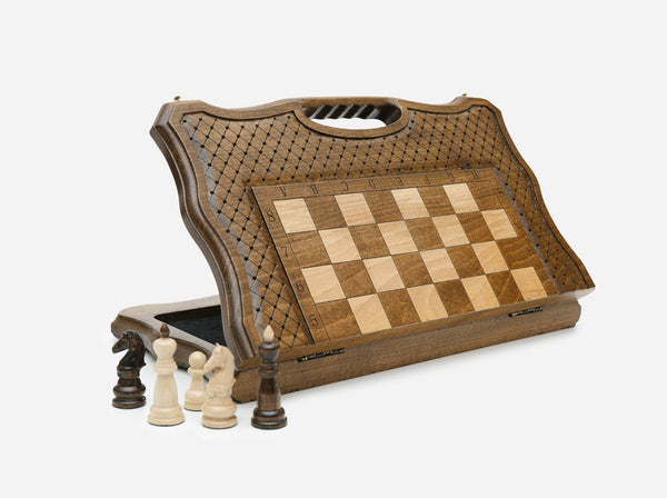 Classic folding chess set standing open, showing the playing face, carved lattice border and built-in carry handle