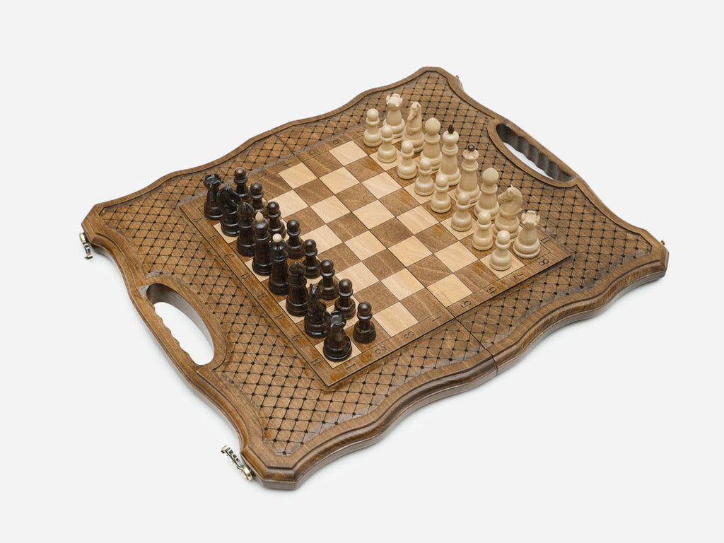 Close-up of the turned chess pieces on the maple and walnut inlaid squares