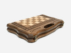 Interior of the opened board with carved detailing and a felt-lined base