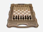 Detail of the turned beech and walnut chess pieces on the inlaid squares
