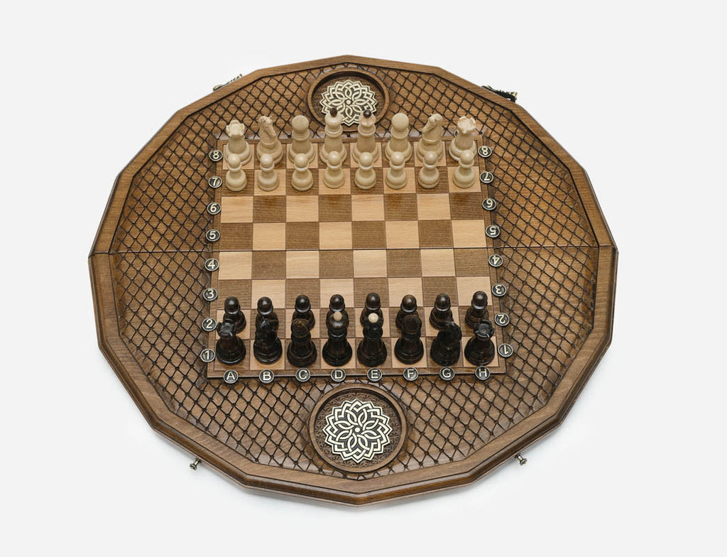 Full-size wooden chess set with carved geometry