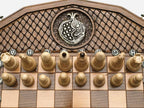Pomegranate and grapevine chess set shown folded